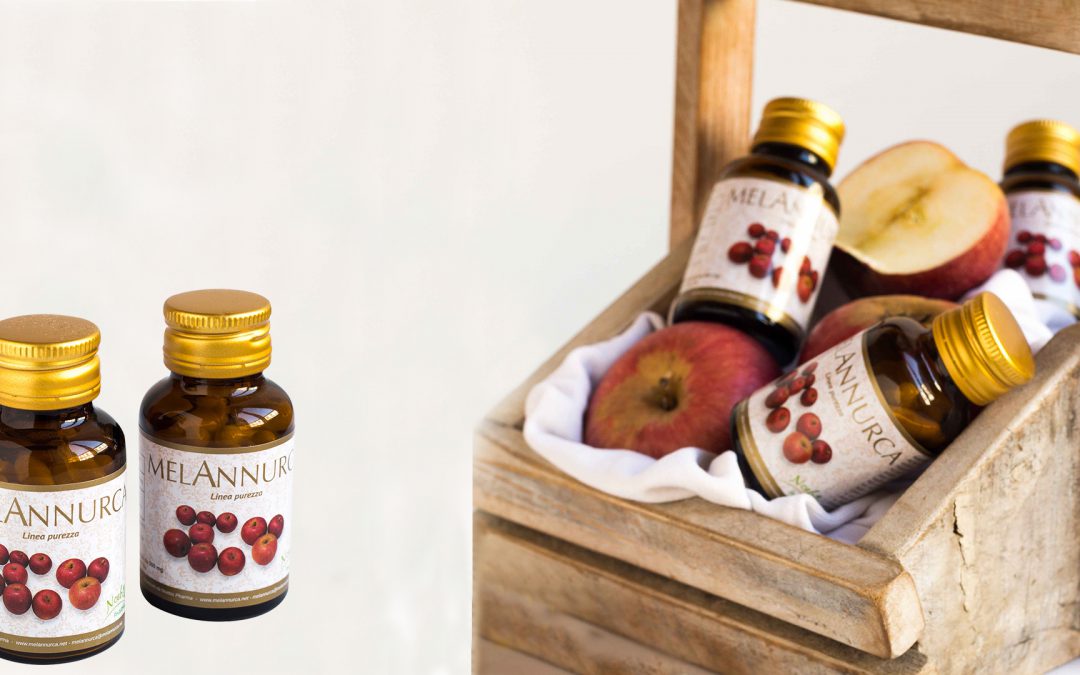 Flaconi di integratore alimentare Melannurca con mele annurca fresche, banner homepage - foto prodotto Noebis Pharma
